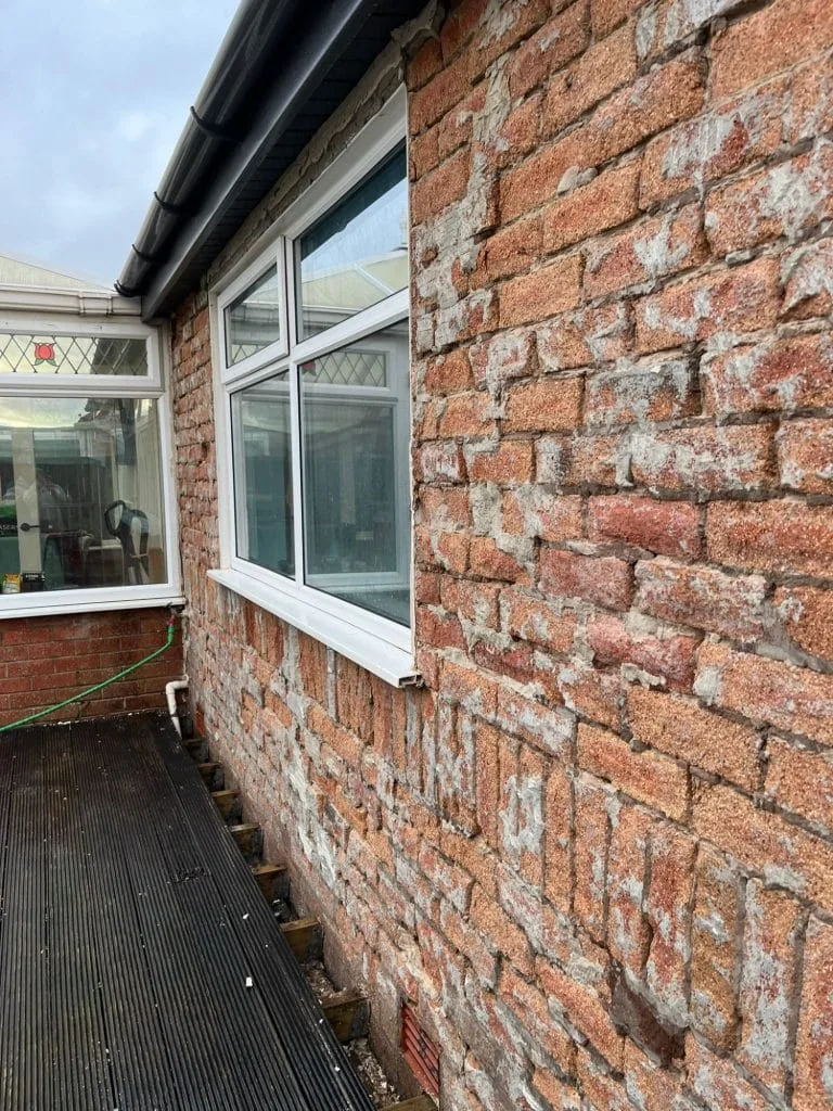 Brick wall before rendering old brickwork