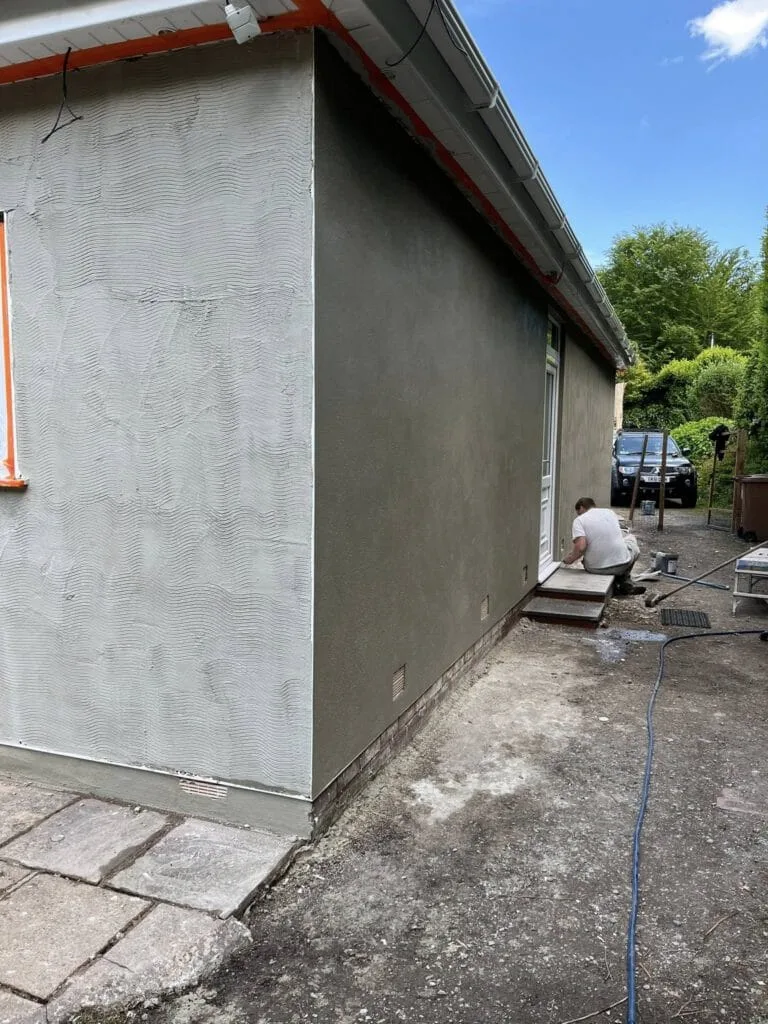 Side elevation render finish and access steps