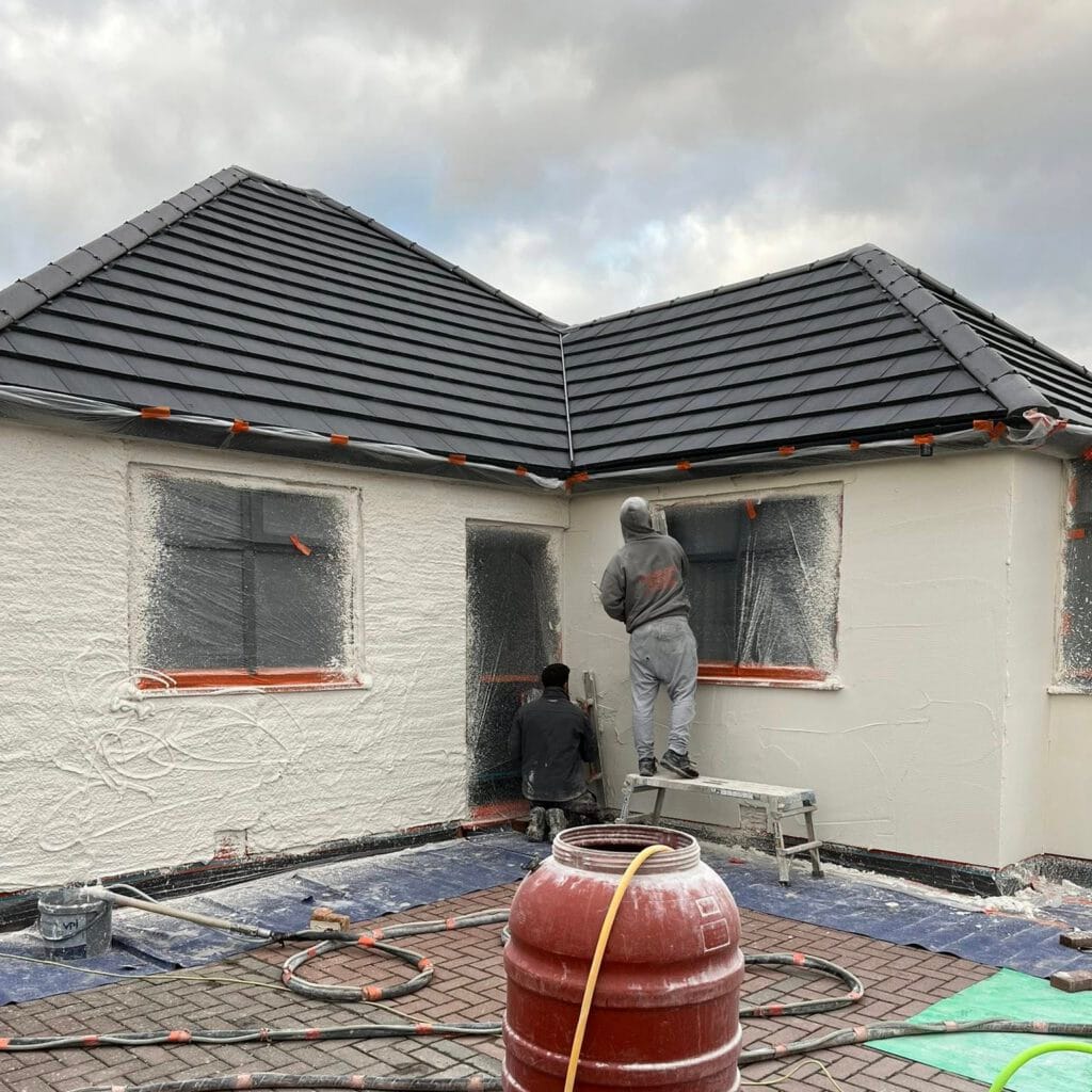 Exterior house with fresh spray render finish